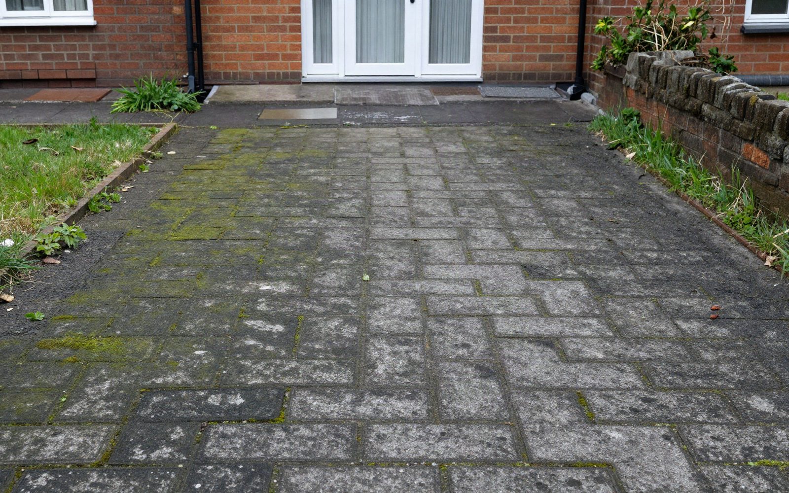 Block paved driveway — before cleaning
